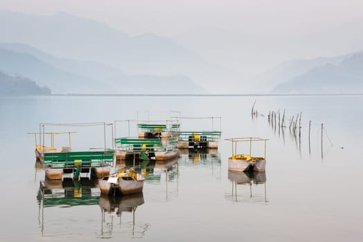 Pedalos on Phewa lake in Pokhara, Nepal