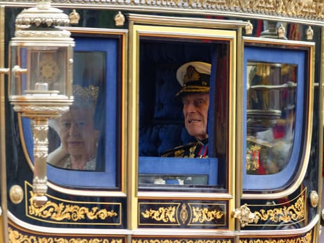 London, UK. May 8th, 2013. Queen Elizabeth II and Prince Philip leaving Buckingham Palace and going to the State Opening of Parliament.