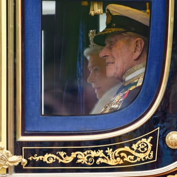 London, UK. May 8th, 2013. Queen Elizabeth II and Prince Philip leaving Buckingham Palace and going to the State Opening of Parliament.