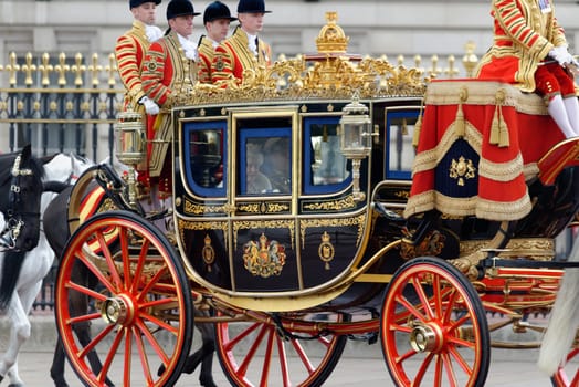 London, UK. May 8th, 2013. Queen Elizabeth II and Prince Philip leaving Buckingham Palace and going to the State Opening of Parliament.