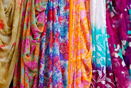 Colorful clothes and saris on display