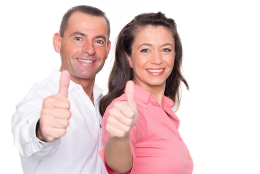 Happy middle-aged couple against a white background