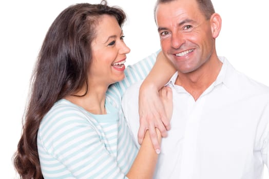 Happy middle-aged couple against a white background