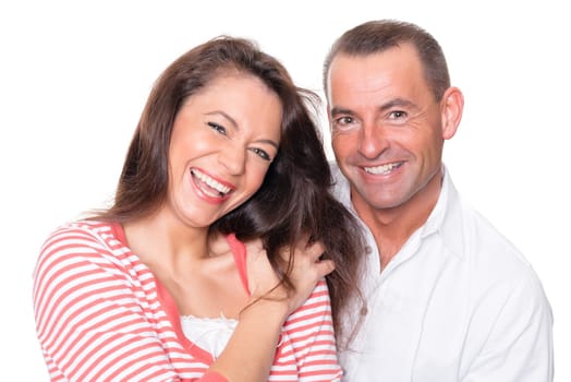 Happy middle-aged couple against a white background