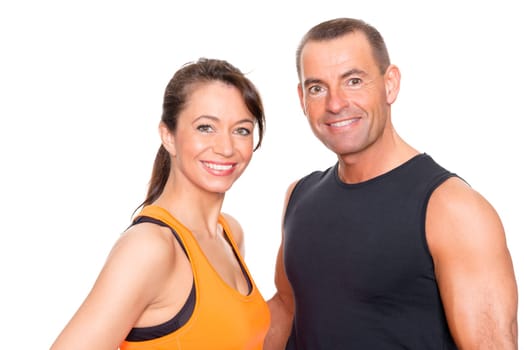 Sporty couple against a white background