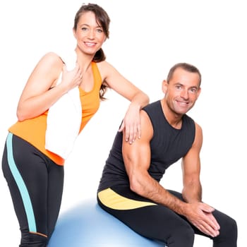 Sporty couple against a white background