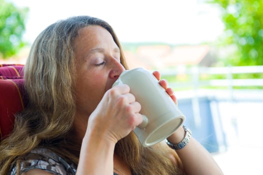 woman is drinking beer