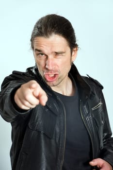 man is pointing in to the camera