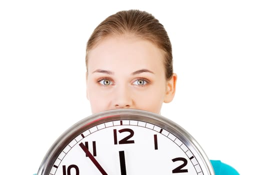 happy young woman holding office clock isolated on white background