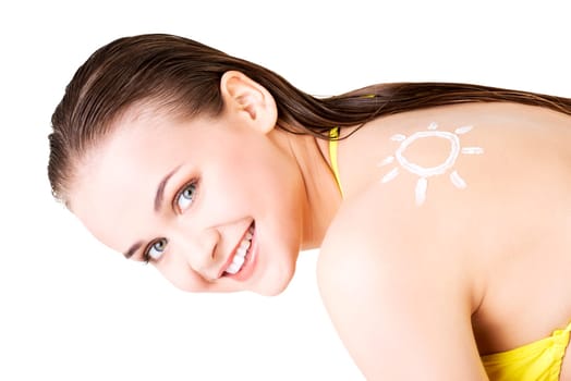 attractive woman in yellow bikini with sun-shaped sun cream on her body. isolated on white.