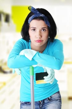 tired and exhausted cleaning woman portrait