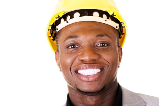 Happy successful businesman in helmet. Isolated on white.