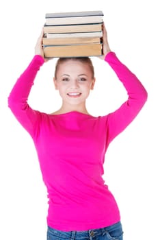 Young caucasian woman (student) with bookd on her head