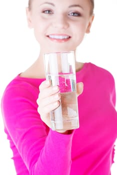 Attractive caucasian woman drinking water from glass