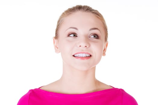 Surprised and excited woman looking up, isolated on white