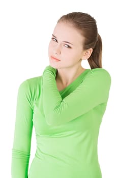 Young woman holding hand on her neck. Neck pain concept