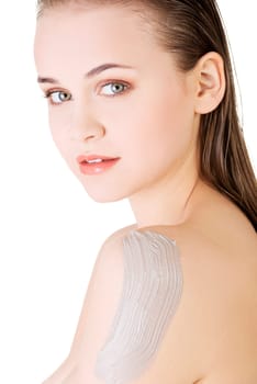 Beautiful face of spa woman with healthy clean skin and clay mask on arm. Isolated on white.