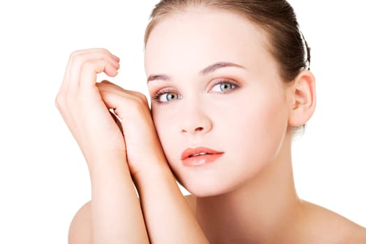 Beautiful face of spa woman with healthy clean skin. Isolated on white.