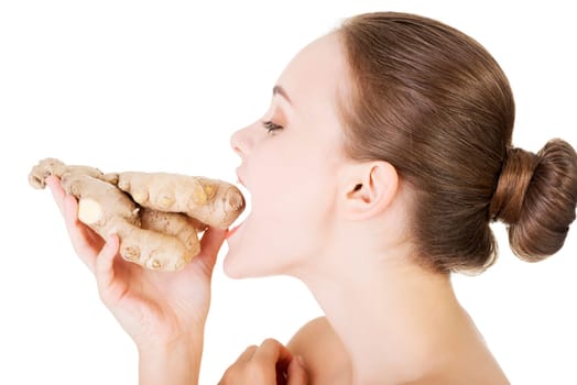 Beautiful woman with fresh ginger, isolated on white