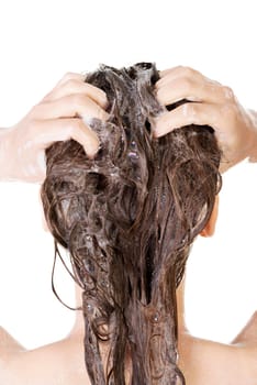 Young woman in shower washing her hairs isolated on white background