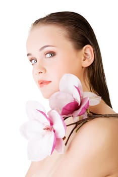 Beautiful face of spa woman with healthy clean skin and pink flowers. Isolated on white.