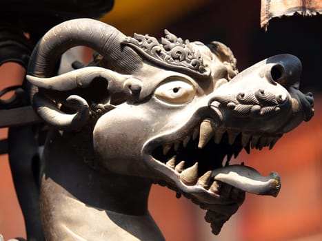 bronze lion statue in temple in Nepal