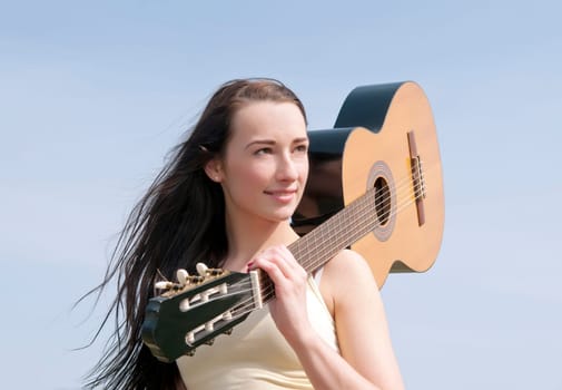 young woman with guitar