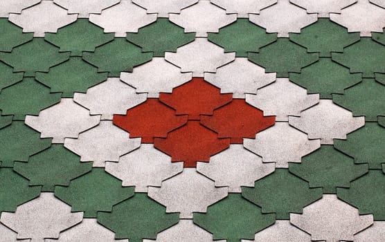 Close up of multicolored pattern on barn roof