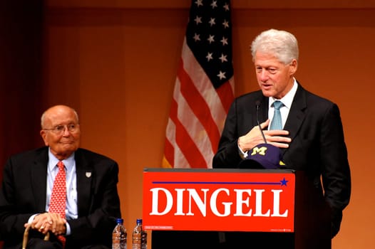 ANN ARBOR, MI - OCTOBER 24: Former President Bill Clinton speaks at a "bring out the vote"" rally in Ann Arbor, MI October 24, 2010, with Congressman John Dingell of Michigan"