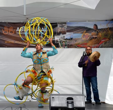 Vancouver, BC - June 26:  World-champion Hoop Dancer Alex Wells concludes his performance at the National Aboriginal Awareness Celebration, June 26, 2011.