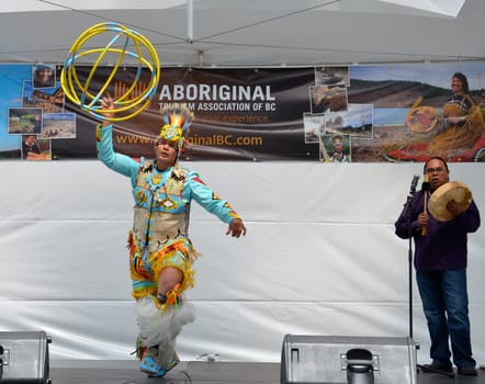 Vancouver, BC - June 26:  World-champion Hoop Dancer Alex Wells performs at the National Aboriginal Awareness Celebration, June 26, 2011.