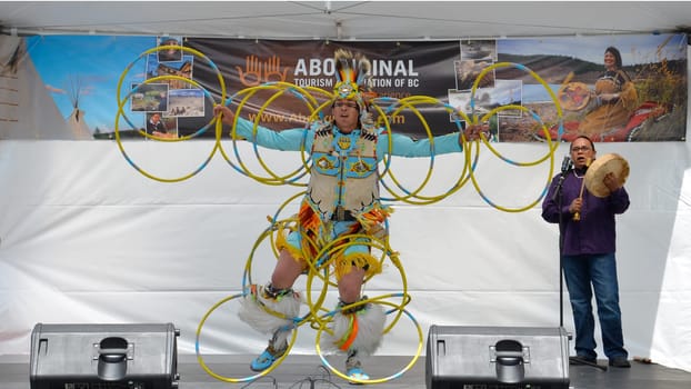 Vancouver, BC - June 26:  World-champion Hoop Dancer Alex Wells displays his skills at the National Aboriginal Awareness Celebration, June 26, 2011.