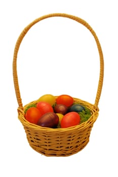Easter wicker basket with colorful plastic eggs, isolated on white with path