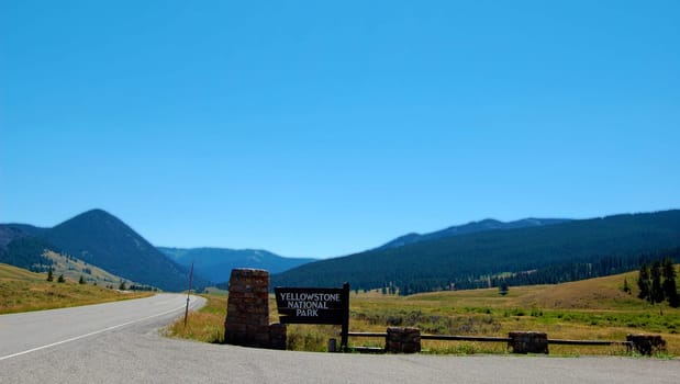Yellowstone remote entrance, showing fields and mountain