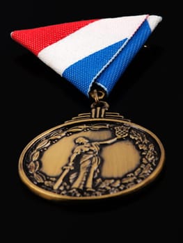 bronze medal for war heroes  isolated on black background