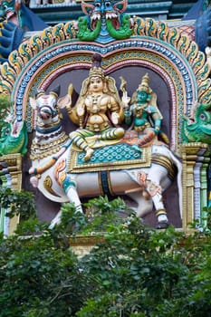 Statue of Shiva and Parvathi sitting on Nandi  at Meenakshi Temple, Madurai, Tamil Nadu, India, Asia