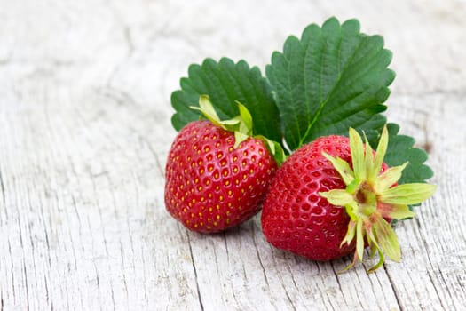 fresh strawberries on wooden background