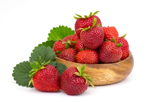 fresh strawberries in a bowl on white background