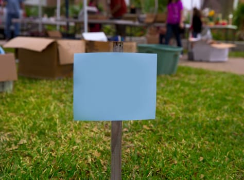 Copy space blank paper on a yard garage sale in US