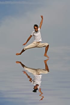 Man jumping on the beach