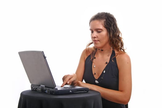 Businesswoman working at desk.