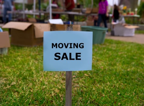 Moving sale in an american weekend on the yard green lawn