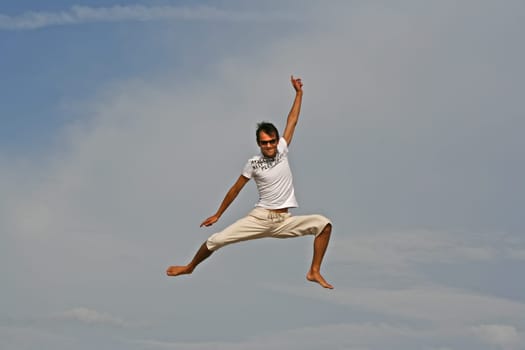 Man jumping on the beach