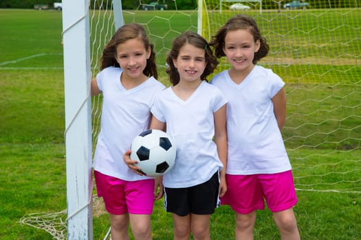 Soccer football kid girls team at sports outdoor fileld before match