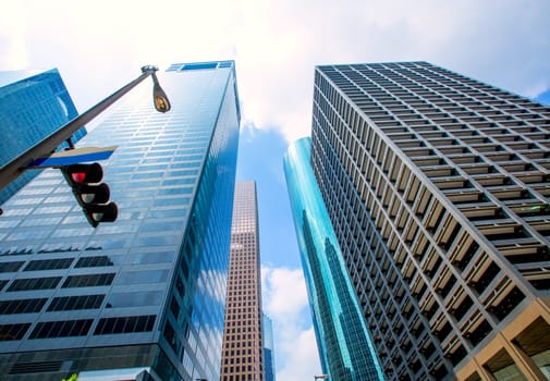 Houston downtown skyscrapers disctict with mirror blue sky reflection