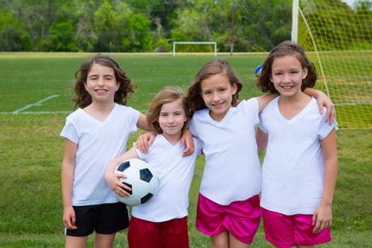 Soccer football kid girls team at sports outdoor fileld before match