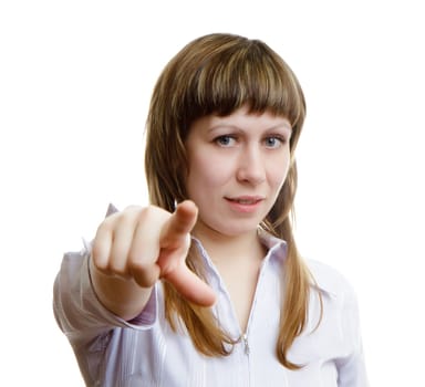 Young girl shows the index finger forward on a white background