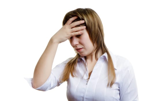 young woman with a headache on a white background