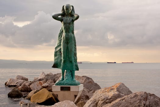 View of the "La mula de trieste"" - Statue on the sea - Italy"