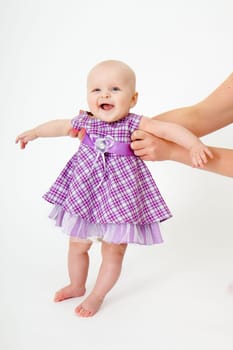 little girl with a beautiful dress on a white background